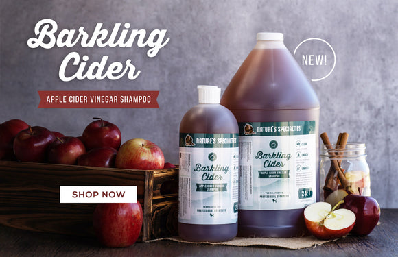Barkling Cider Apple Cider Vinegar Shampoo for pets in gallon and 32 oz-sized bottles.
