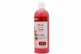 A plastic bottle of Nature's Specialties Spiced Cranberry pet shampoo, filled with a deep pink-red liquid, on a solid white background.