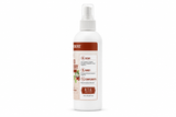 A white plastic spray bottle of R.T.U. Spiced Cranberry Cologne with a white spray top, shown on a clean white background.