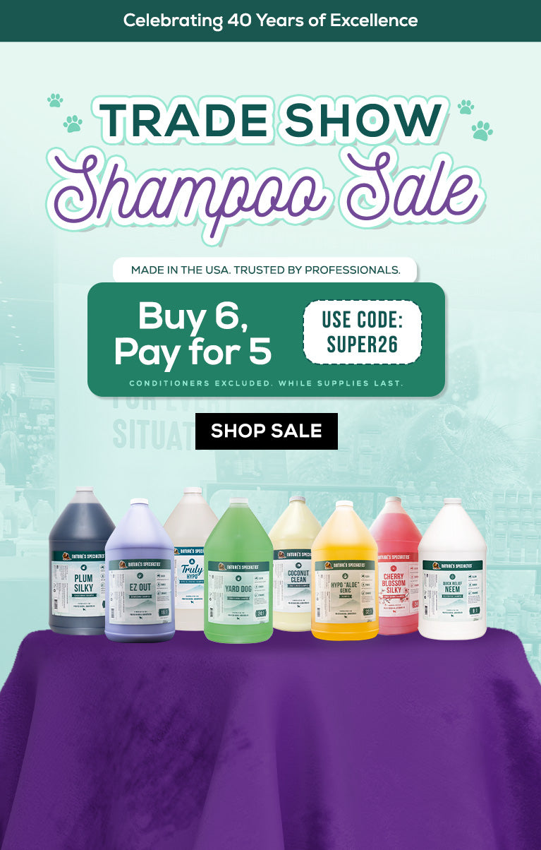 Promotional graphic for a 'TradeShow Shampoo Sale' featuring multiple bottles of pet shampoo in various colors (blue, purple, green, yellow, pink, white) lined up on a purple draped table against a mint green background with sale text overlays.