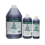 Three bottles of Nature's Specialties Plum Silky Conditioning Shampoo. 128oz, 32oz, 16oz sizes.