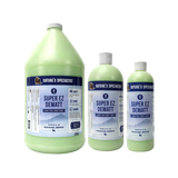 Three bottles of Nature's Specialties Super EZ Dematt conditioner on a white background