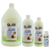 Four different-sized bottles of Nature's Specialties Super EZ DeMATT Solution for groomers.