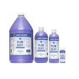Four bottles Nature's Specialties Plum Silky Moisturizing Pet Conditioner in varying sizes.