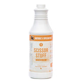 A 32 oz. bottle of Nature's Specialties Scissor Stuff Scissoring Spray for static reduction.