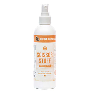 A gallon-size bottle of Nature's Specialties Scissor Stuff Scissoring Spray for groomers.